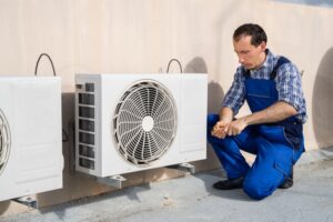 Man Working On AC System